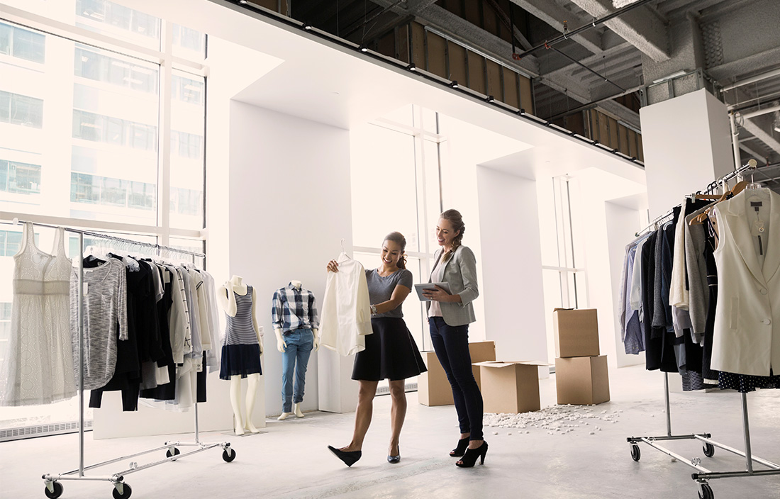 Image of two women looking at clothes 