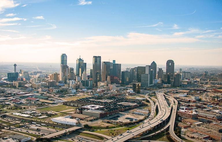 Skyline of Dallas, Texas, to represent Industrial Real Estate Market Report