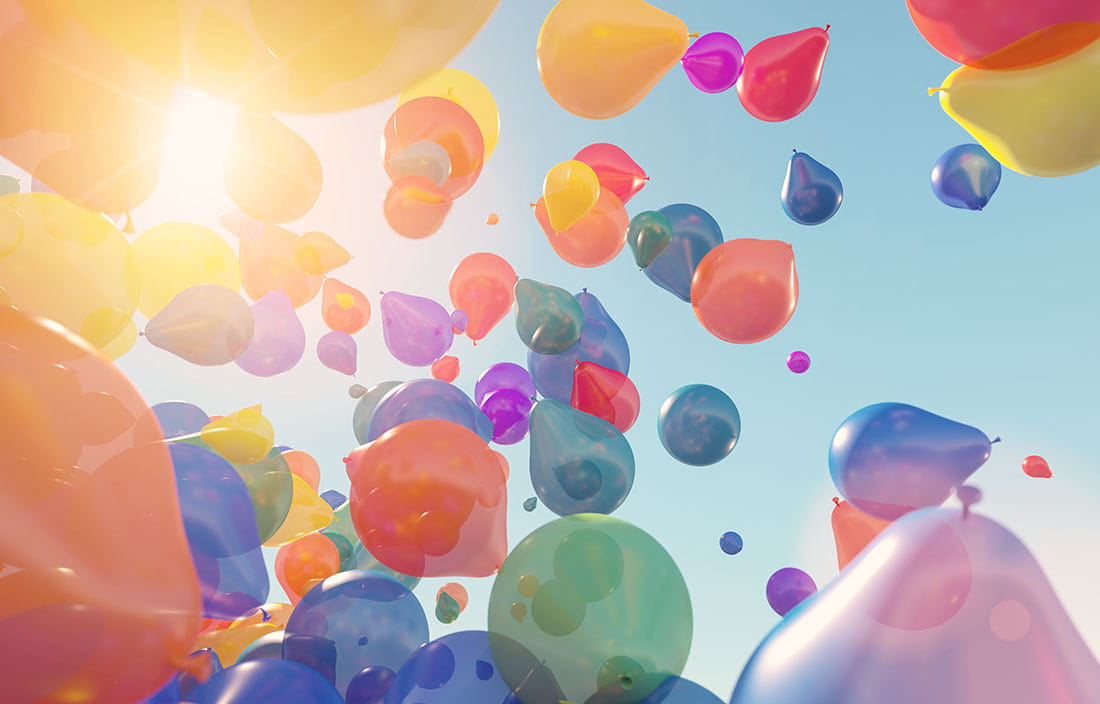 Balloons floating up into the sky