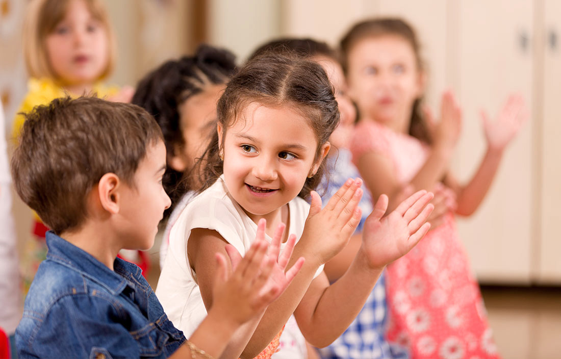 Children clapping