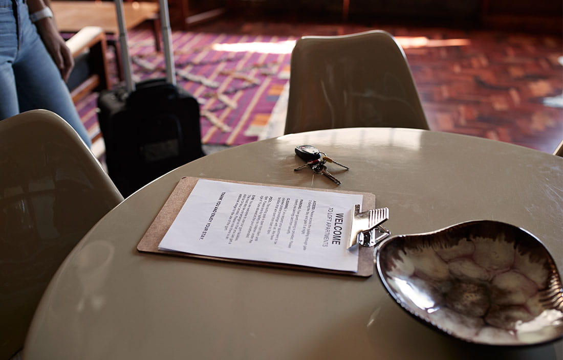 Welcome letter from a landlord on a table in an apartment