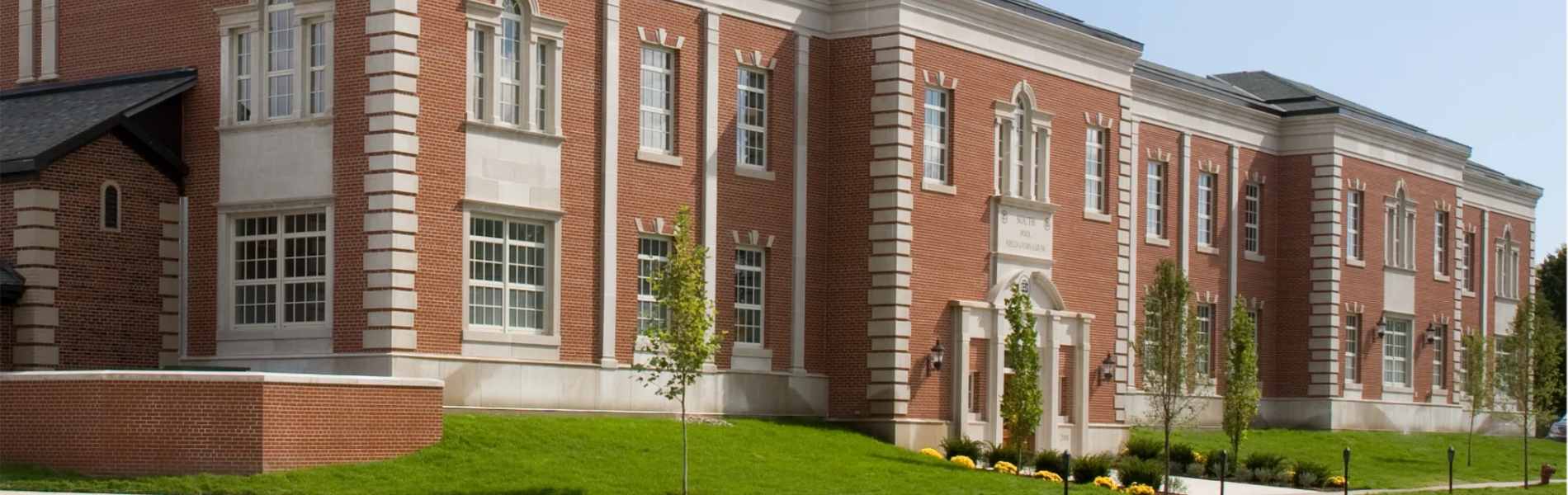 Exterior of historic school building at Grosse Pointe Public School System in Michigan, USA