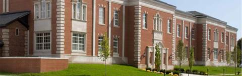 Exterior of historic school building at Grosse Pointe Public School System in Michigan, USA