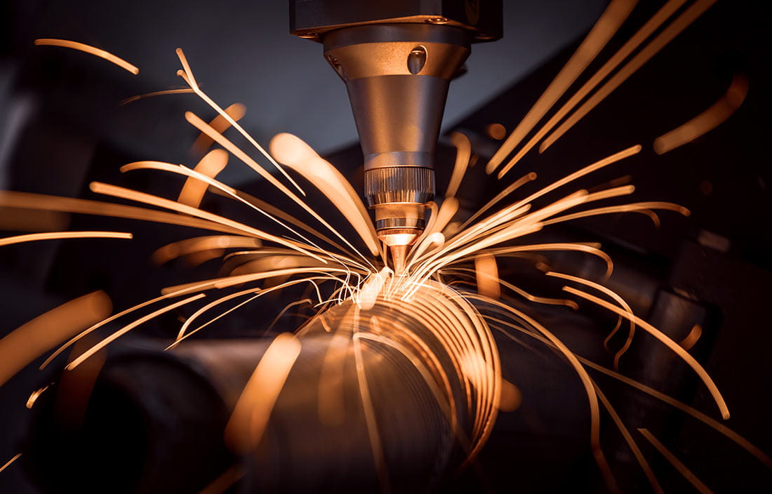 Image of machinery sparking as it works