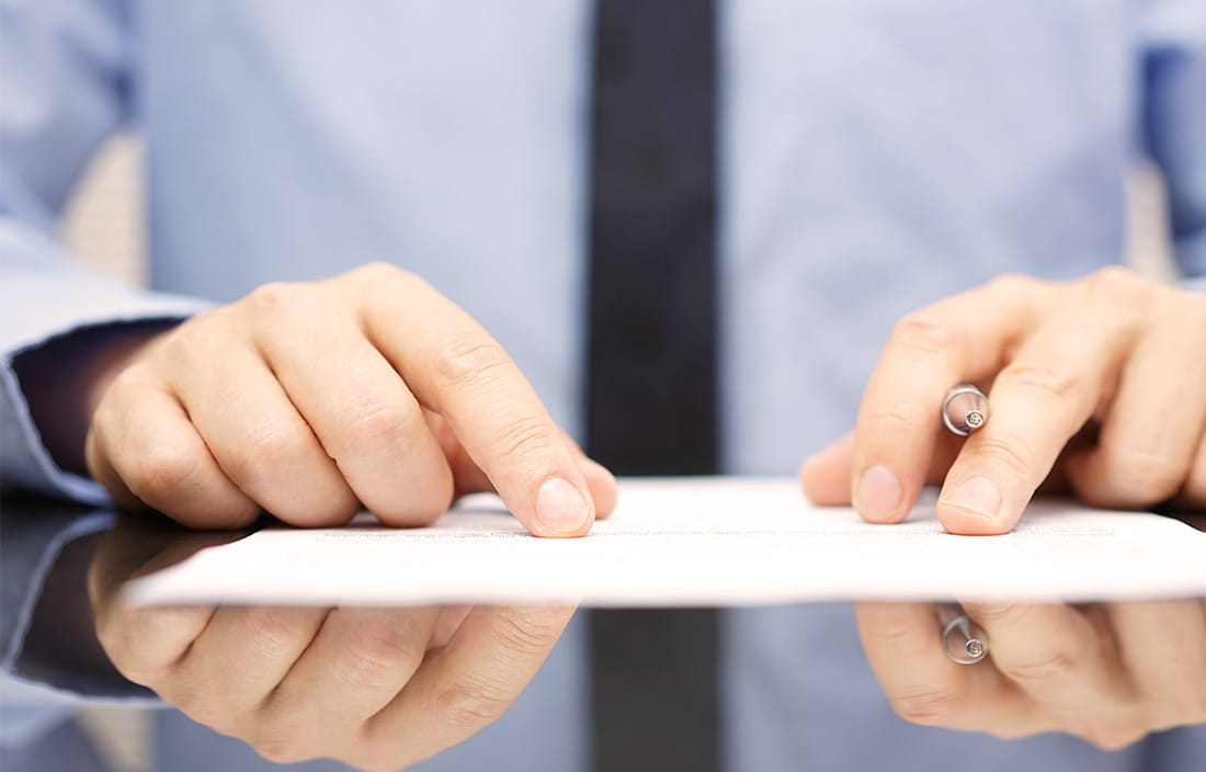 Image of someone looking at a document