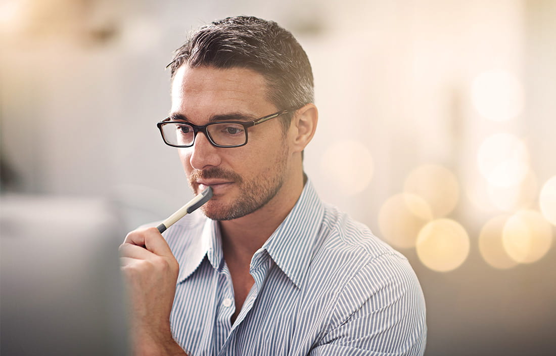 Image of a man with a pen