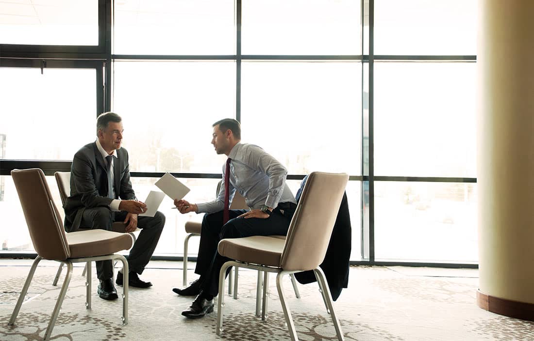 Real estate investing professionals discussing internal rate of return.