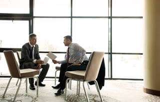 Real estate investing professionals discussing internal rate of return.