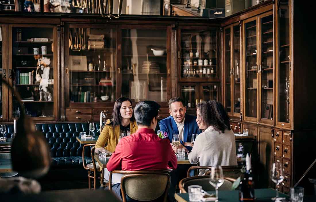 People sitting around a table eating