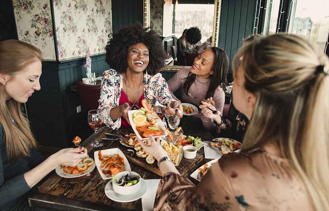 Consumers enjoying a meal