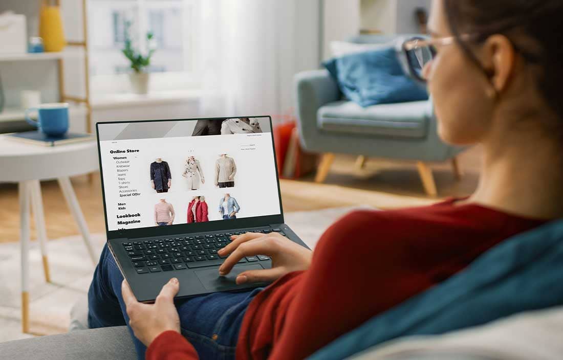 Woman looking at computer screen.