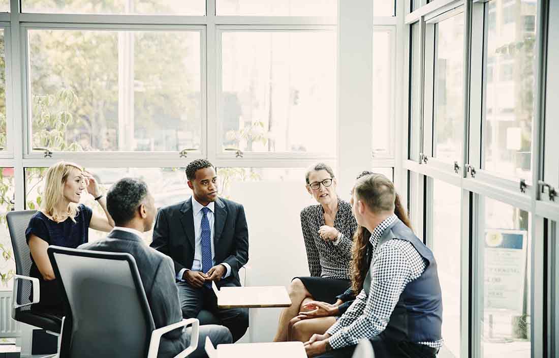 People sitting in a circle talking