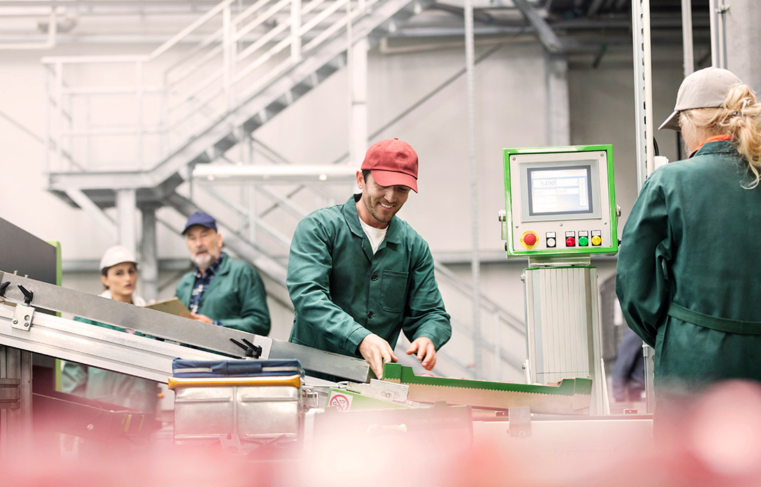 People working on assembly line