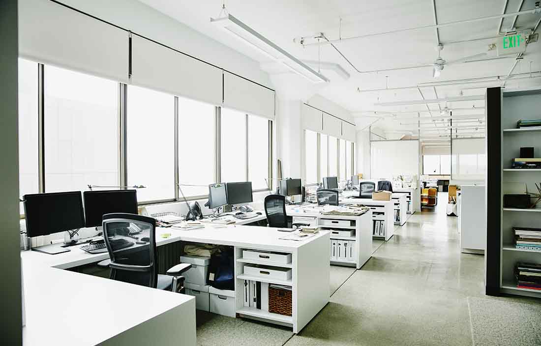 An office space with empty desk