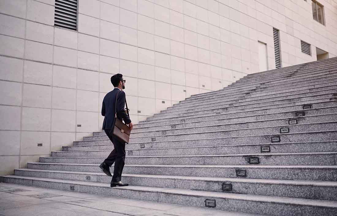 Man walking up stairs