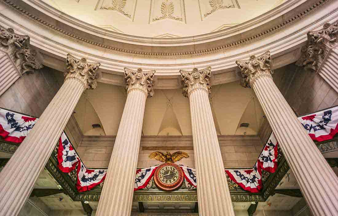 Inside of government building with American flags