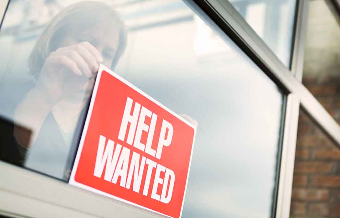 Help wanted sign on window