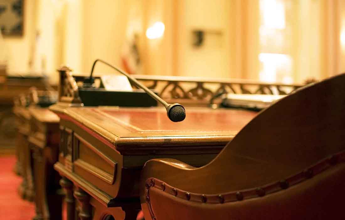 Close-up view of a podium and microphone.